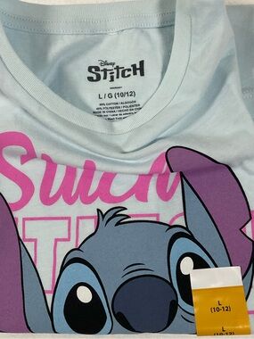 Disney Light Blue Stitch Tee with Pink and Purple. New with Tag.size L(10/12)
